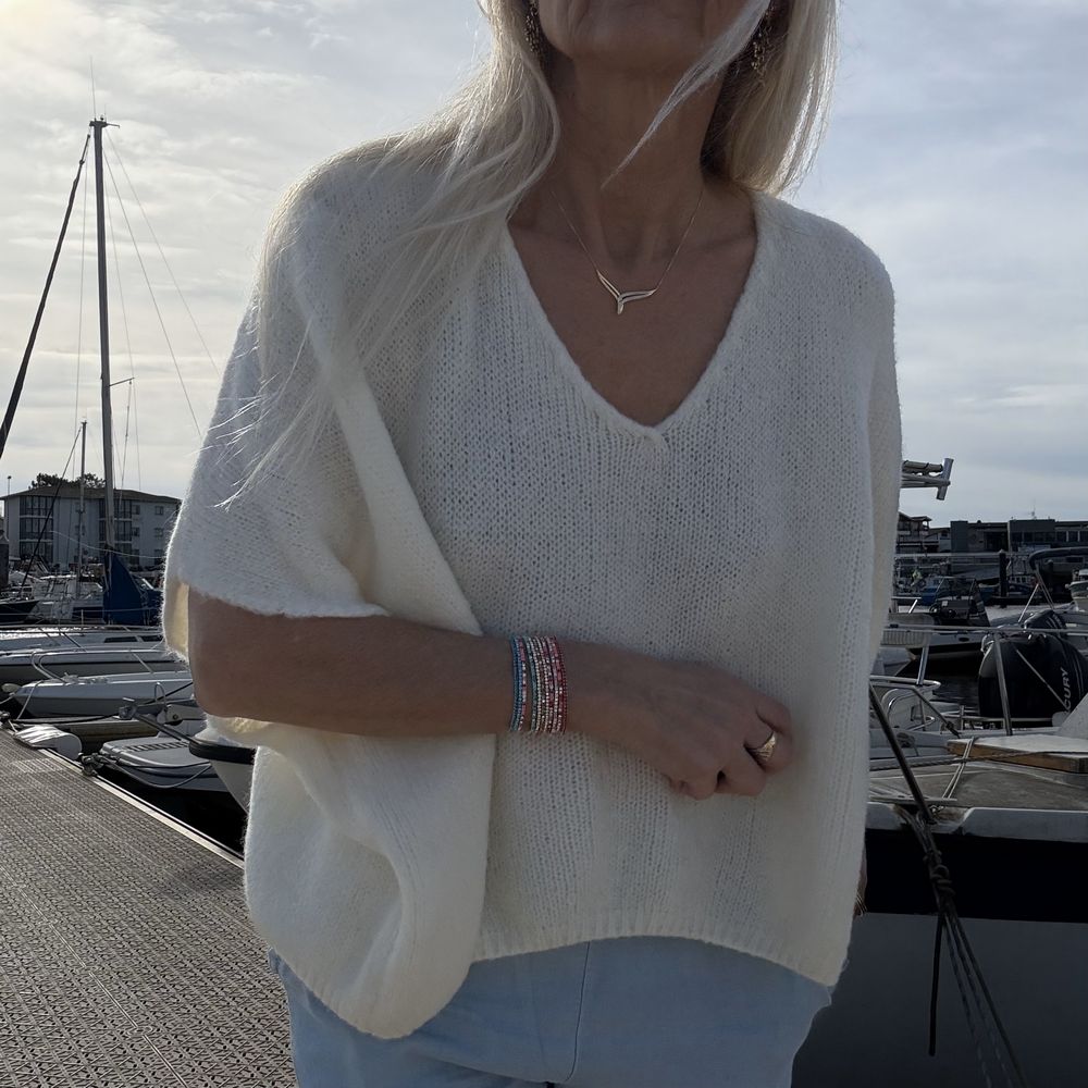 pull sans manche col v blanc