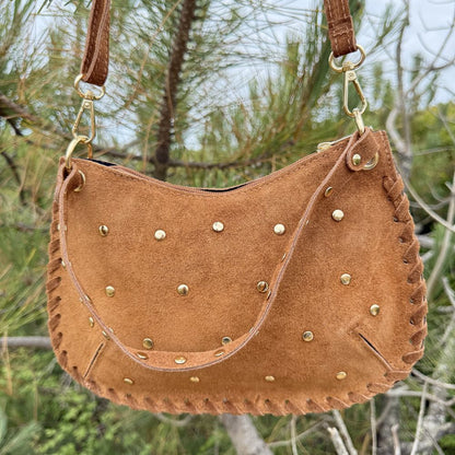 sac bandoulière en cuir avec clous dorés