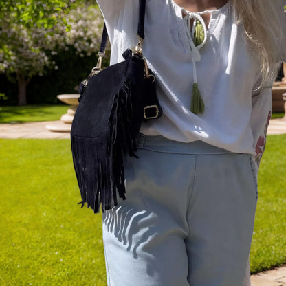 sac bandoulière en cuir  grandes franges tout le tour