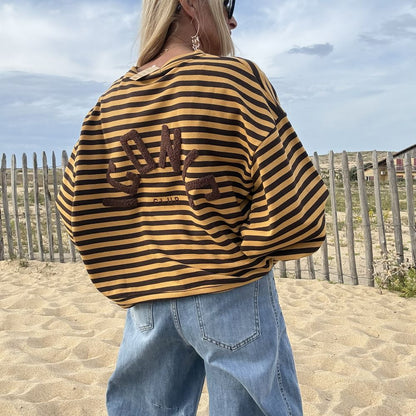 Broderie iconic dans le dos du sweat
