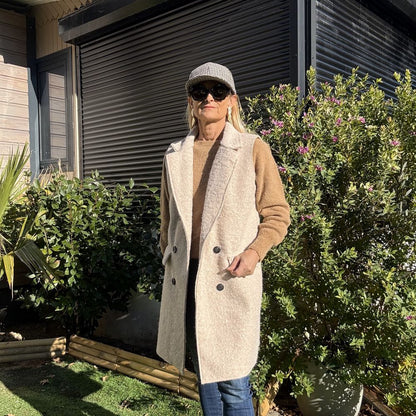 manteau sans manche longueur genou