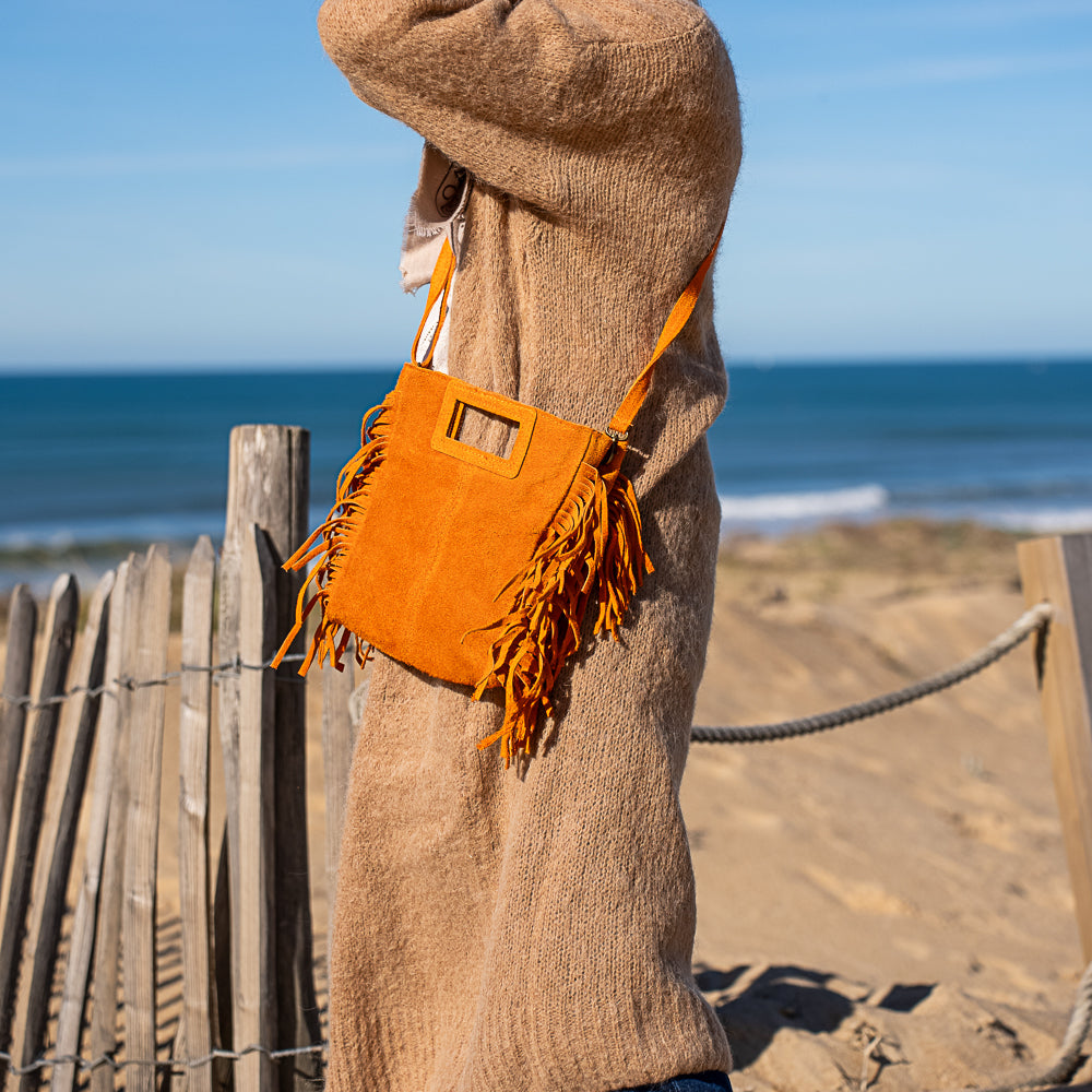 sac bandoulière en cuir jaune et frange