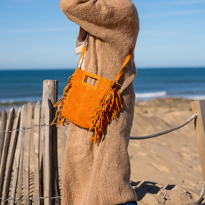 sac bandoulière en cuir jaune et frange