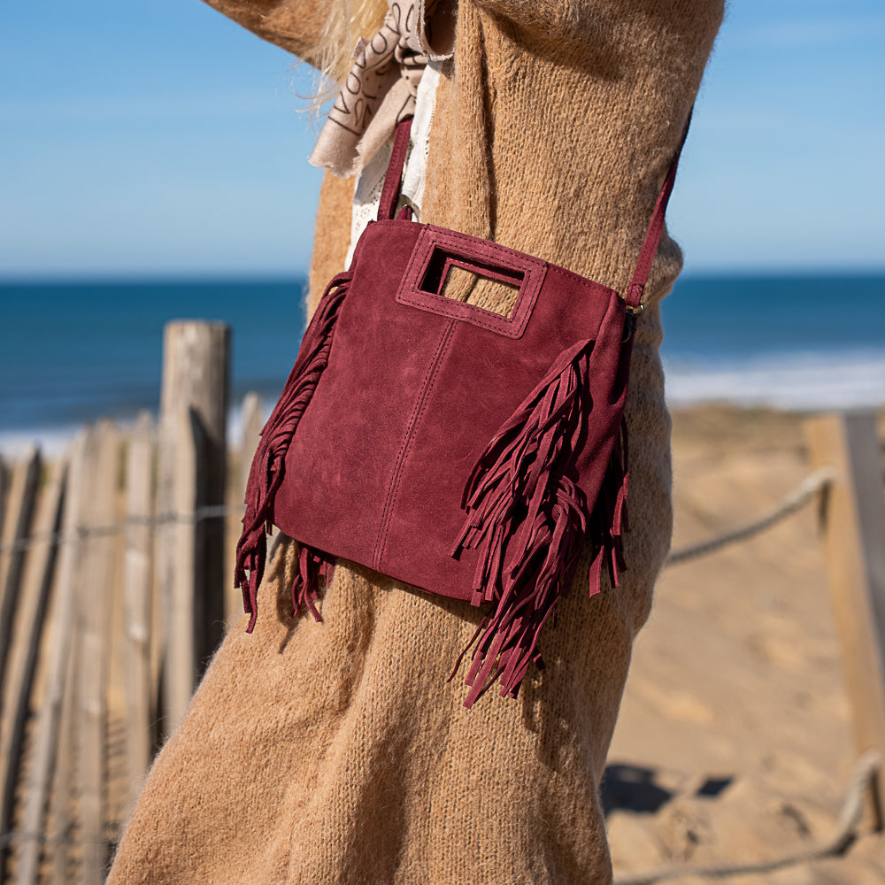 sac bandoulière en cuir bordeaux et frange